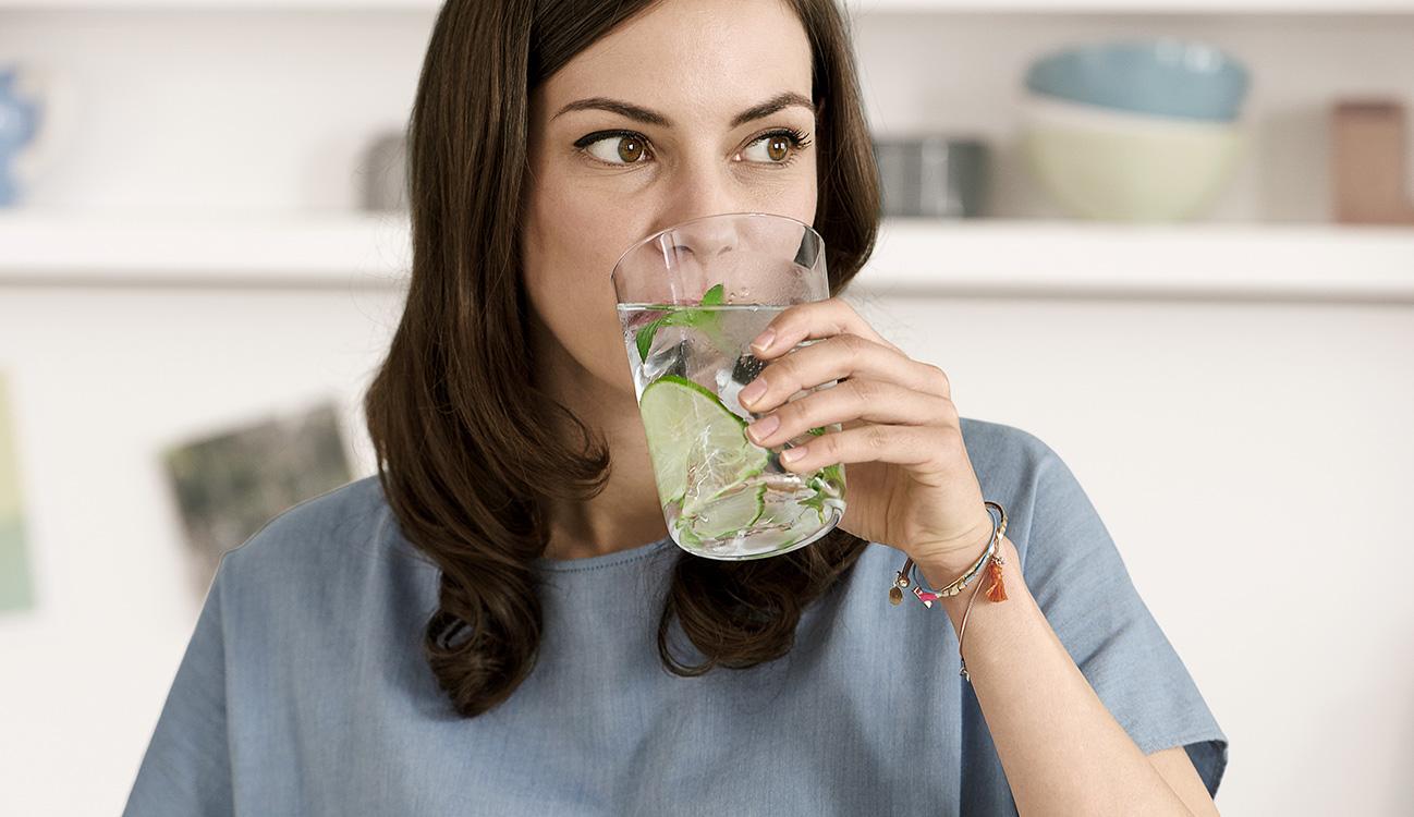 BRITA personal hydration need woman drinking water